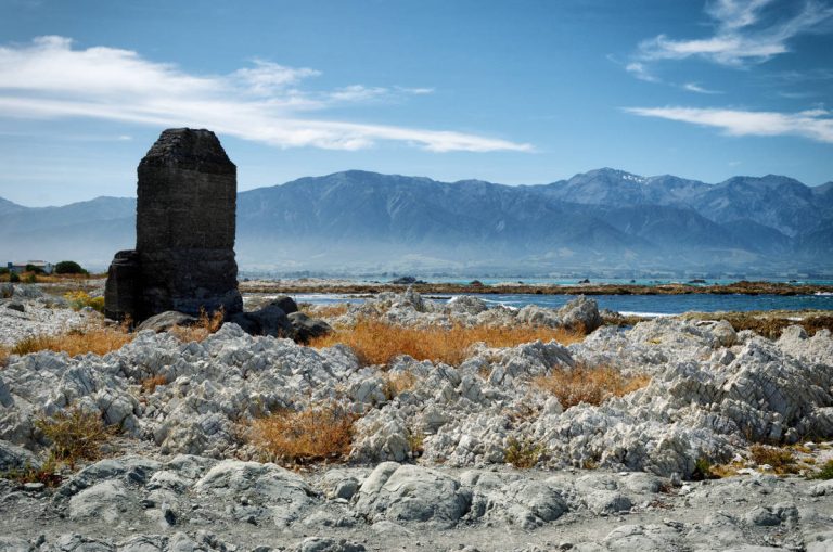 old chimney standing on the rocky kaikoura foreshore