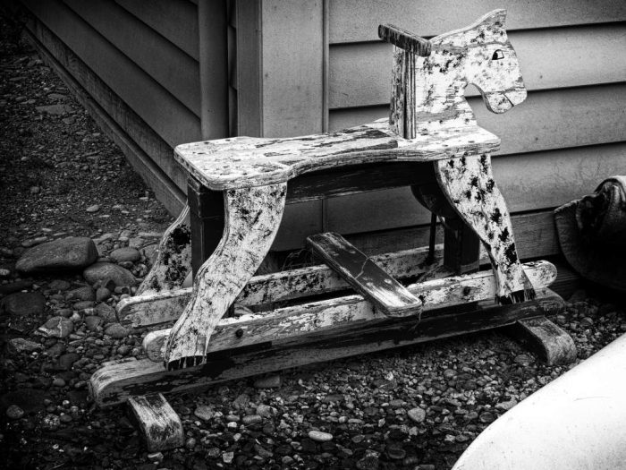 experimenting with black and white a rocking horse appearing to look back over its shoulder at the viewer
